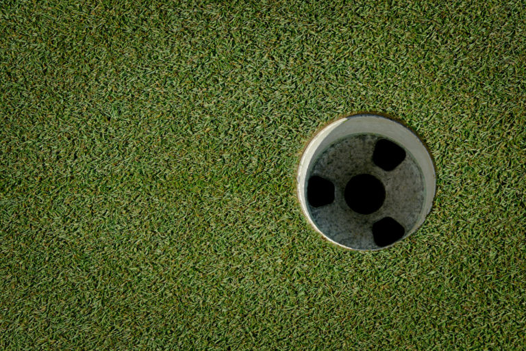 Close-up of a hole at Lonnie Poole Golf Course.
